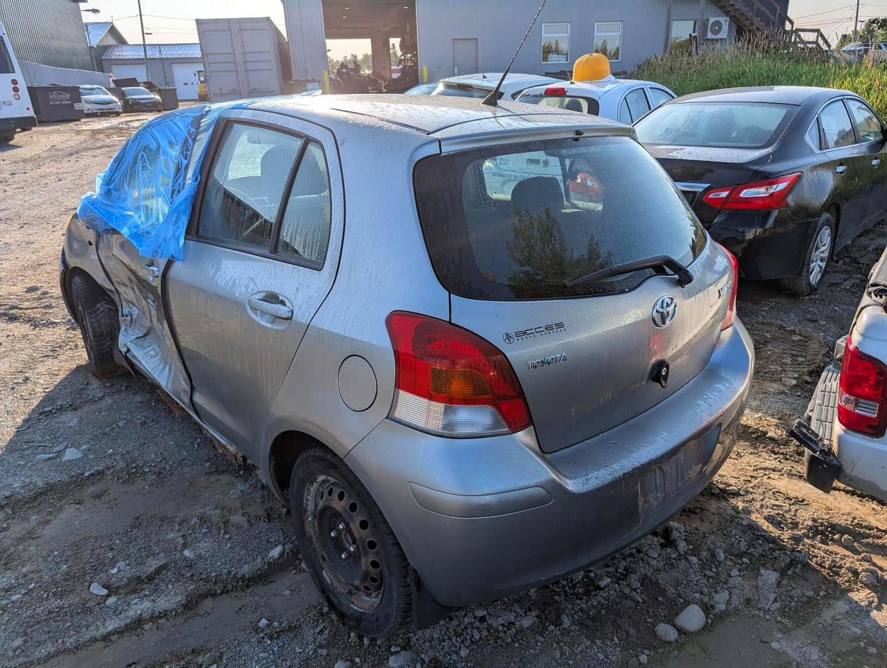 JTDKT923695229651 · 2009 TOYOTA YARIS · 2/11