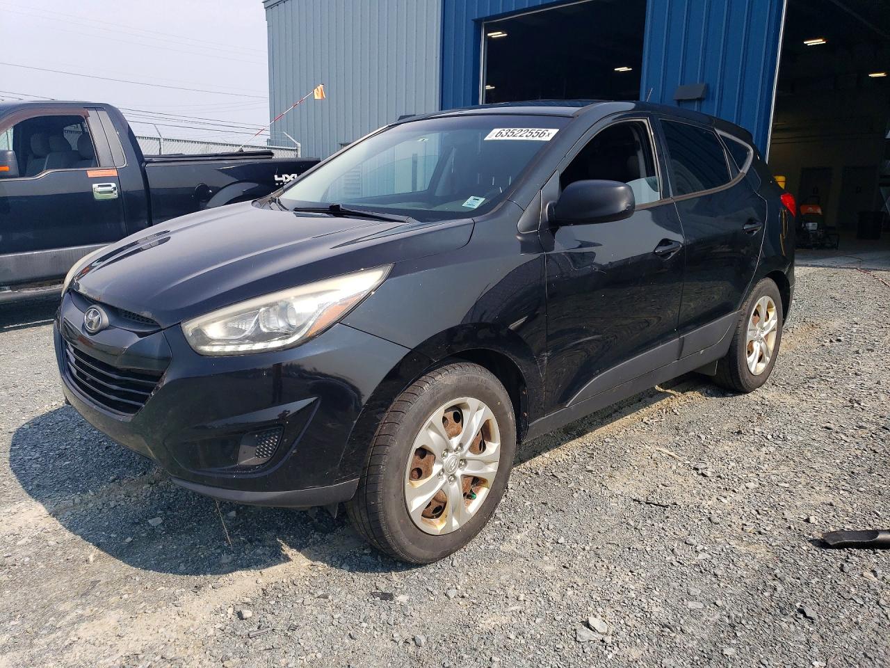 KM8JTCAF8EU893823 · 2014 HYUNDAI TUCSON