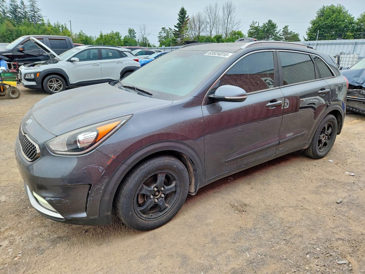 KNDCC3LCXJ5156949 · 2018 KIA NIRO