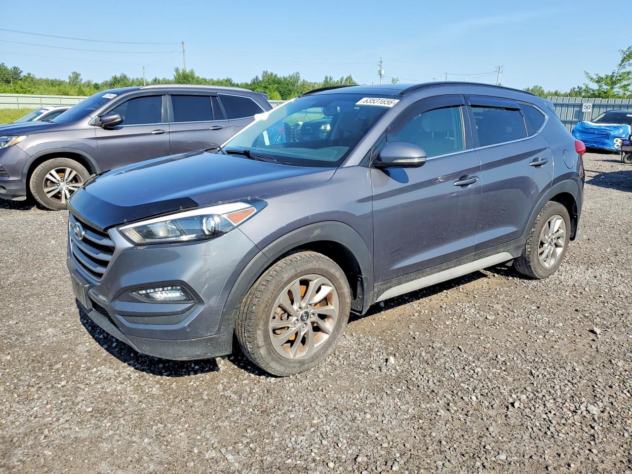 KM8J3CA41HU577005 · 2017 HYUNDAI TUCSON