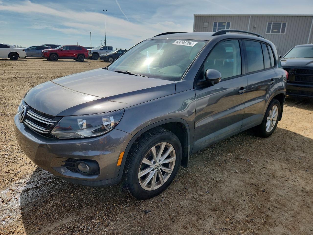 WVGJV3AX6EW609659 · 2014 VOLKSWAGEN TIGUAN