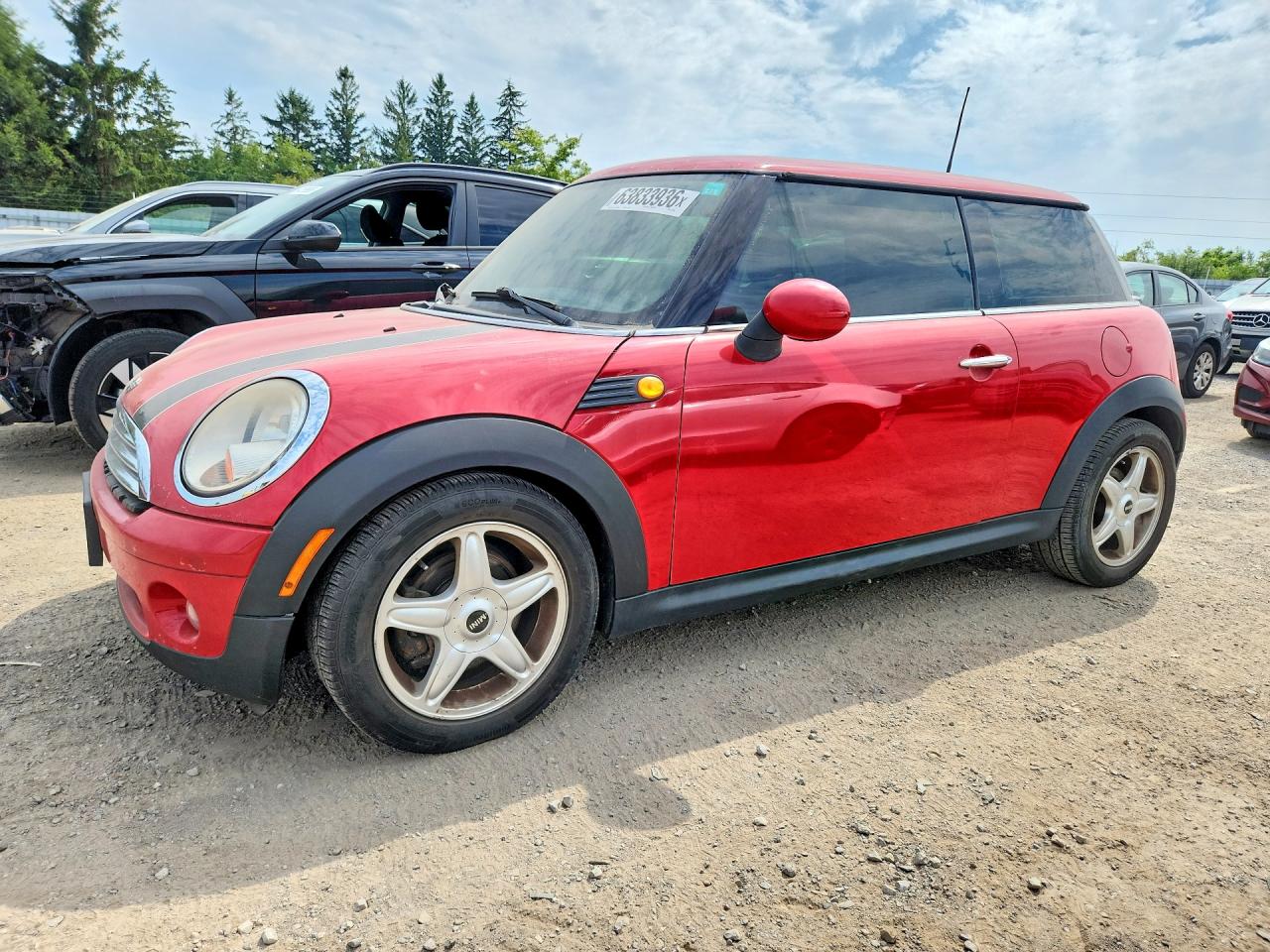 WMWMF33599TZ21134 · 2009 MINI COOPER