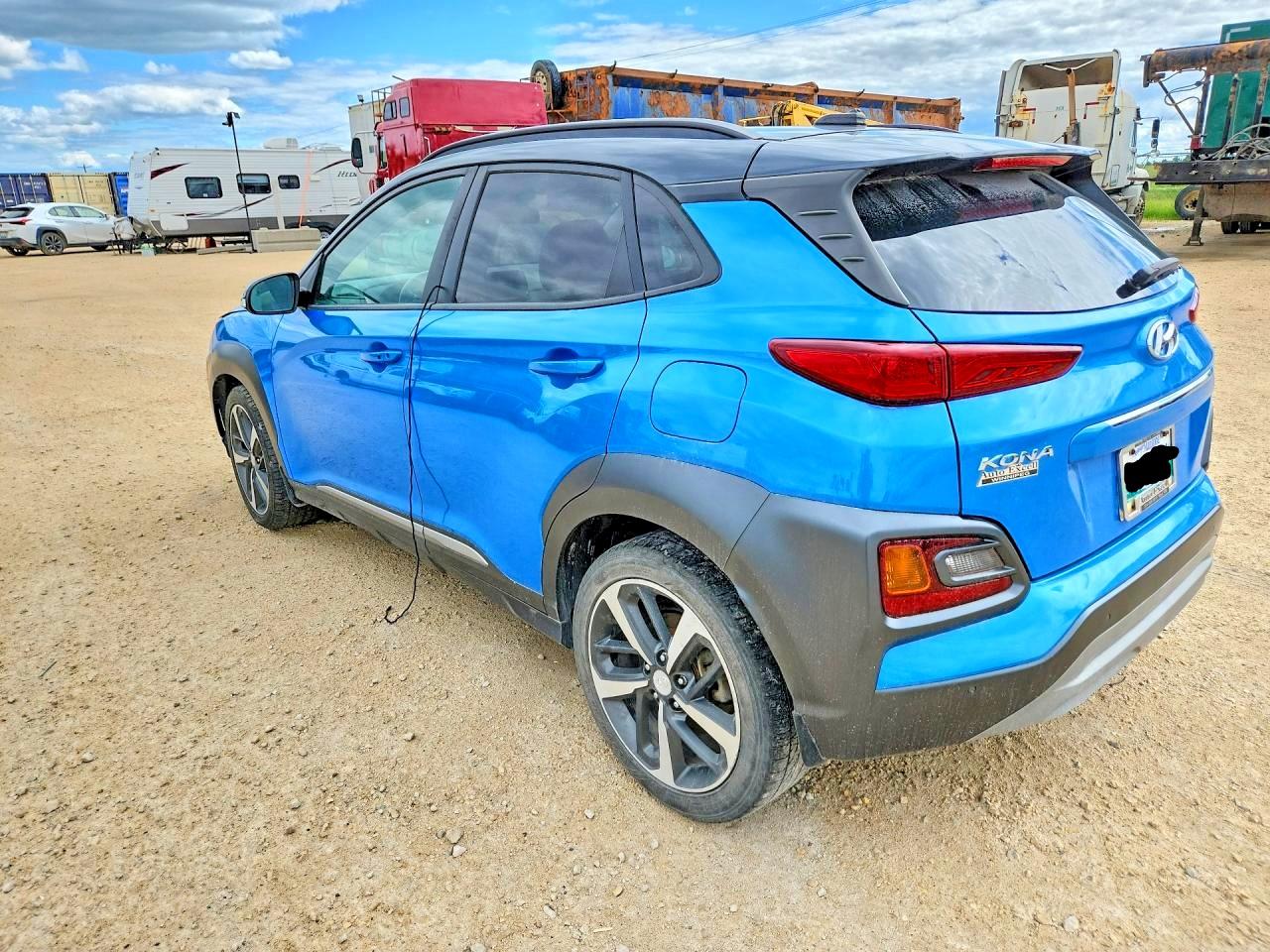 KM8K3CA52JU152945 · 2018 HYUNDAI KONA · 2/13