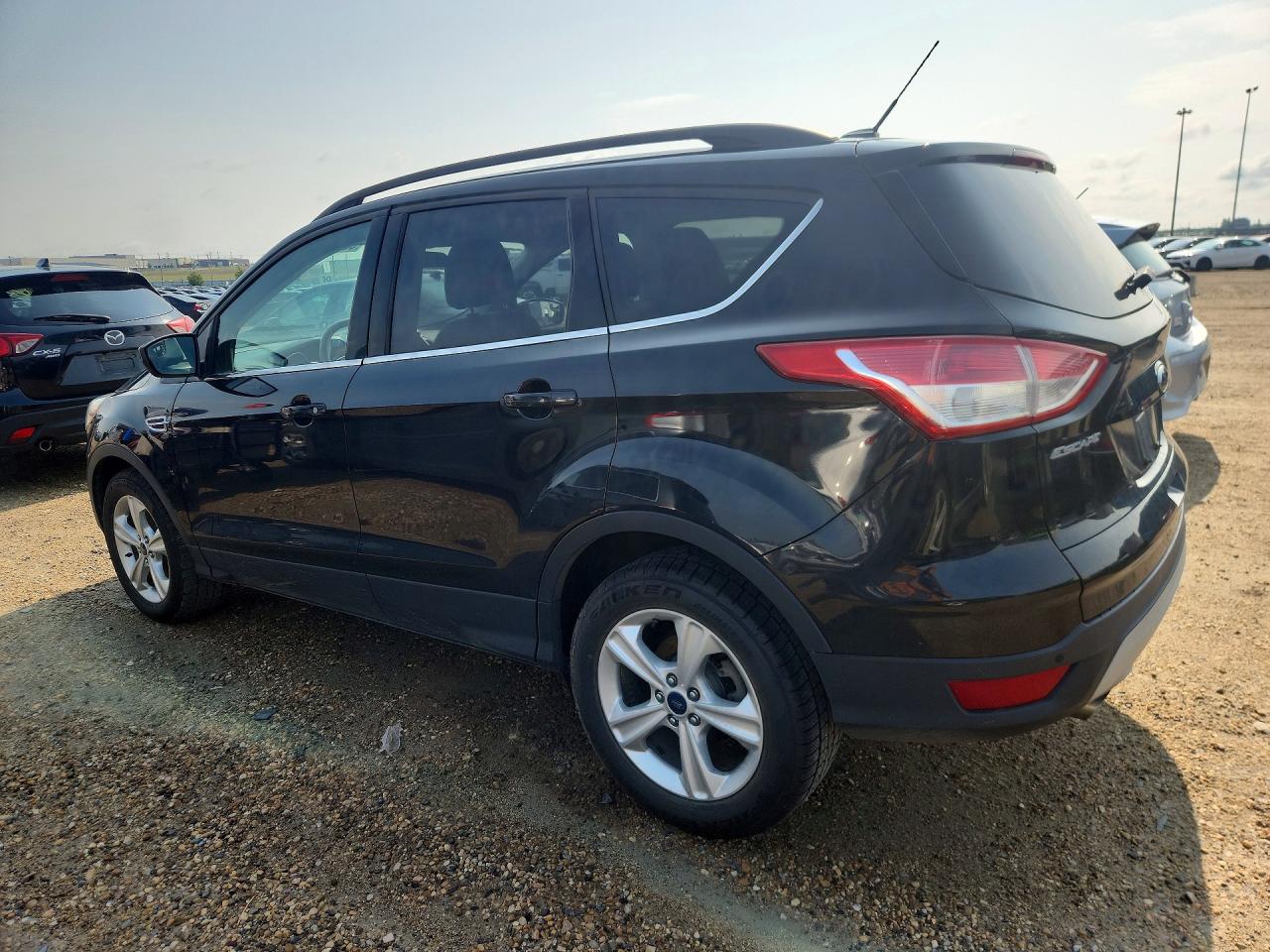 1FMCU9G97EUC95829 · 2014 FORD ESCAPE · 2/13