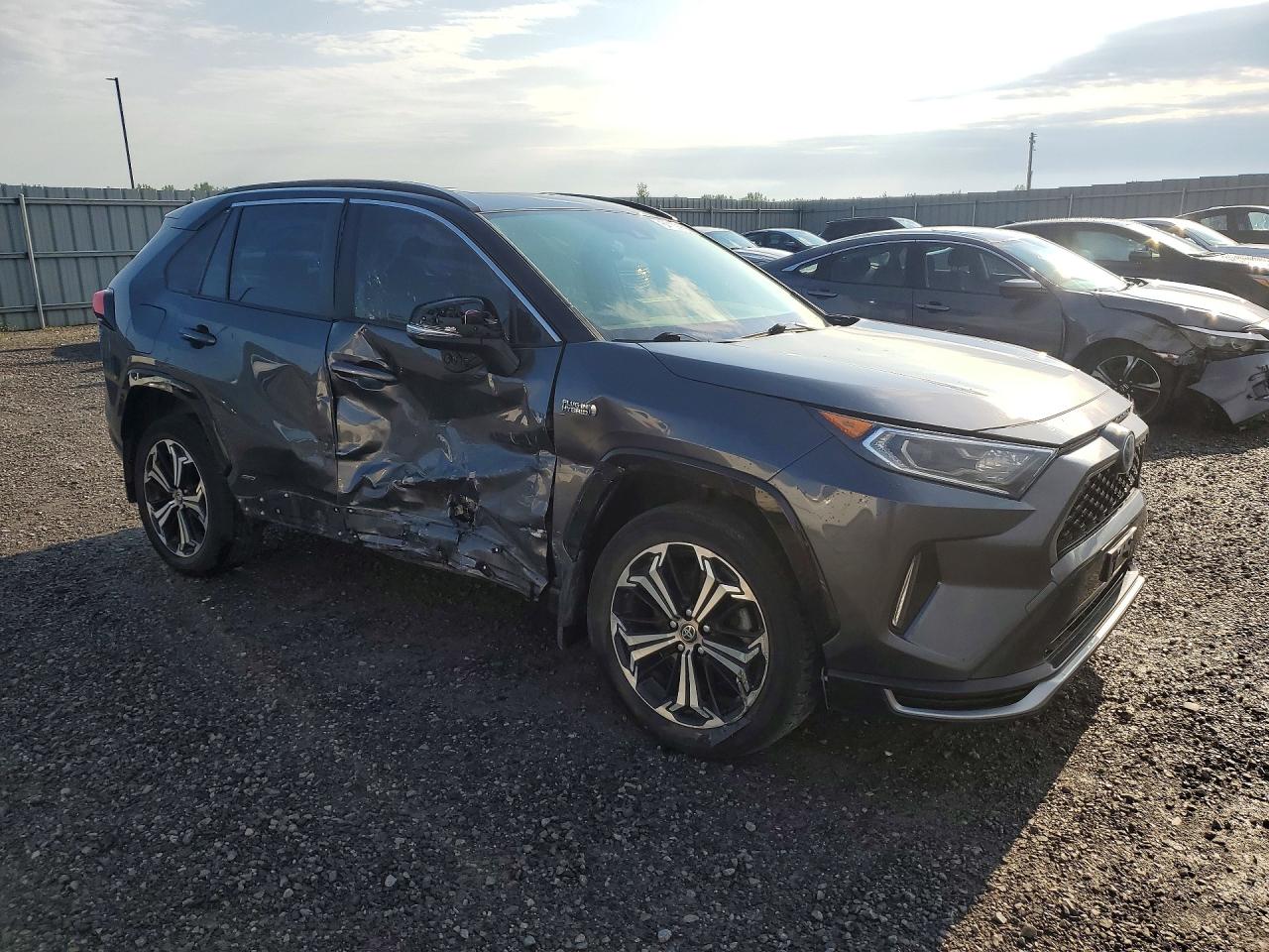 JTMGB3FV2MD039619 · 2021 TOYOTA RAV4 PRIME · 4/13