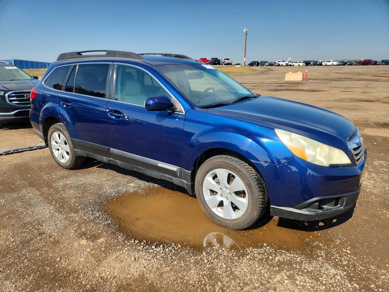 4S4BRCHC6B3380568 · 2011 SUBARU OUTBACK · 4/14