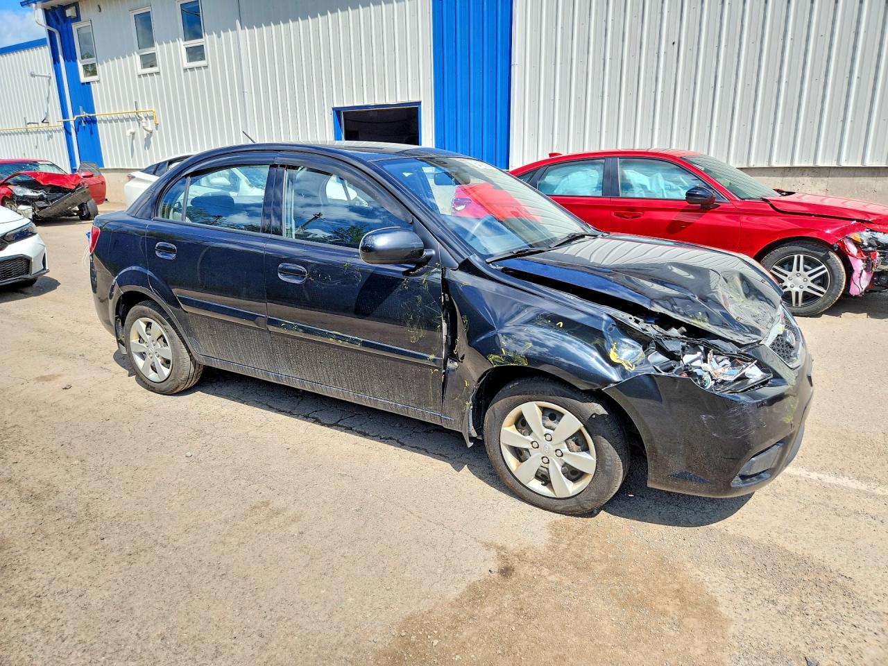 KNADH4B38A6674143 · 2010 KIA RIO · 4/11