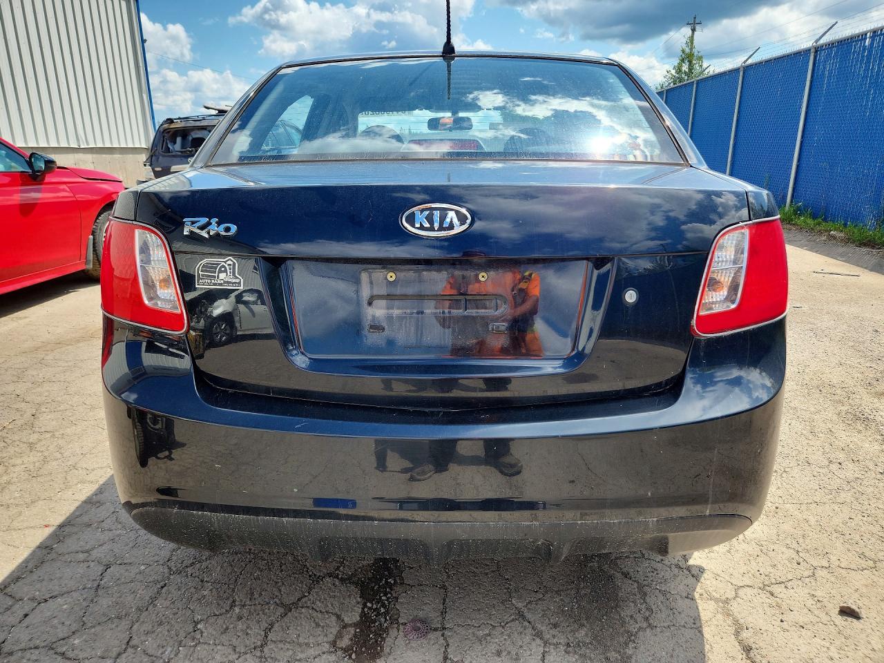 KNADH4B38A6674143 · 2010 KIA RIO · 6/11