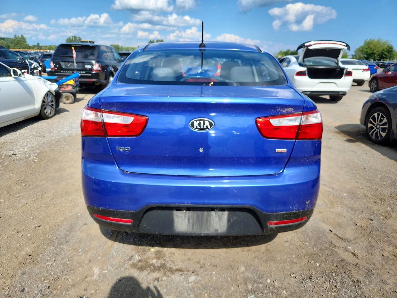 KNADM4A39D6258927 · 2013 KIA RIO · 6/12