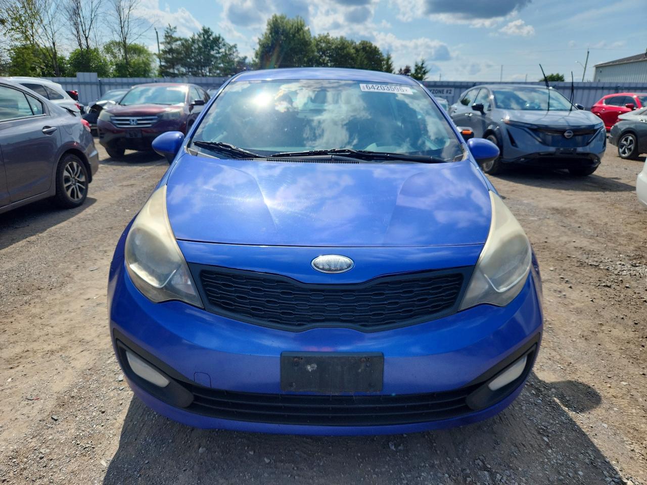 KNADM4A39D6258927 · 2013 KIA RIO · 5/12