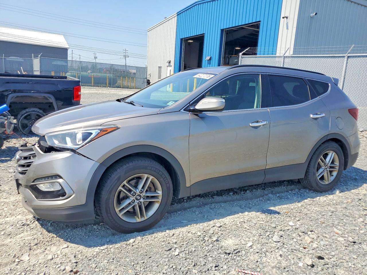 5XYZUDLB8JG517574 · 2018 HYUNDAI SANTA FE SPORT