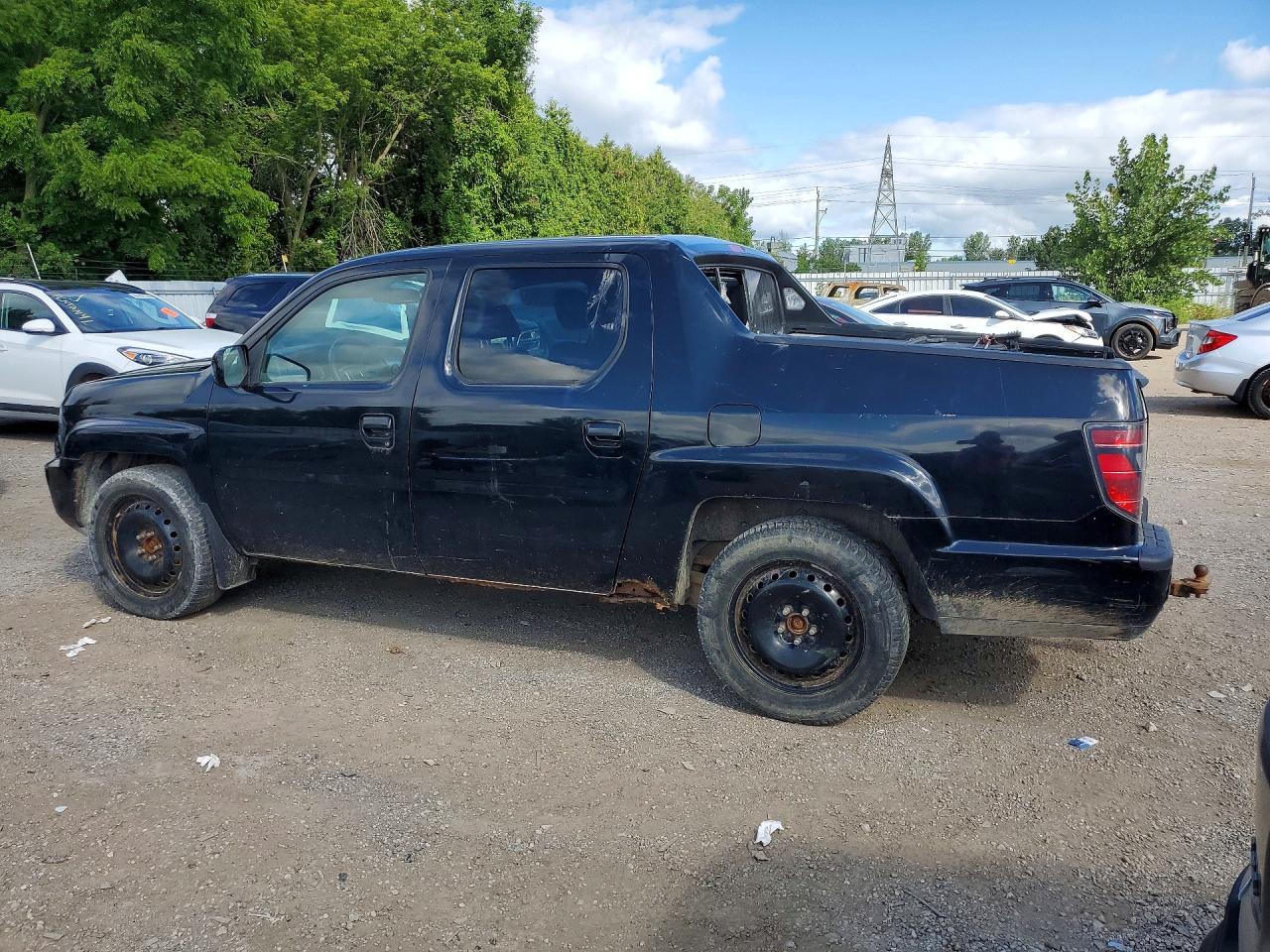 5FPYK1F75DB502752 · 2013 HONDA RIDGELINE · 2/12