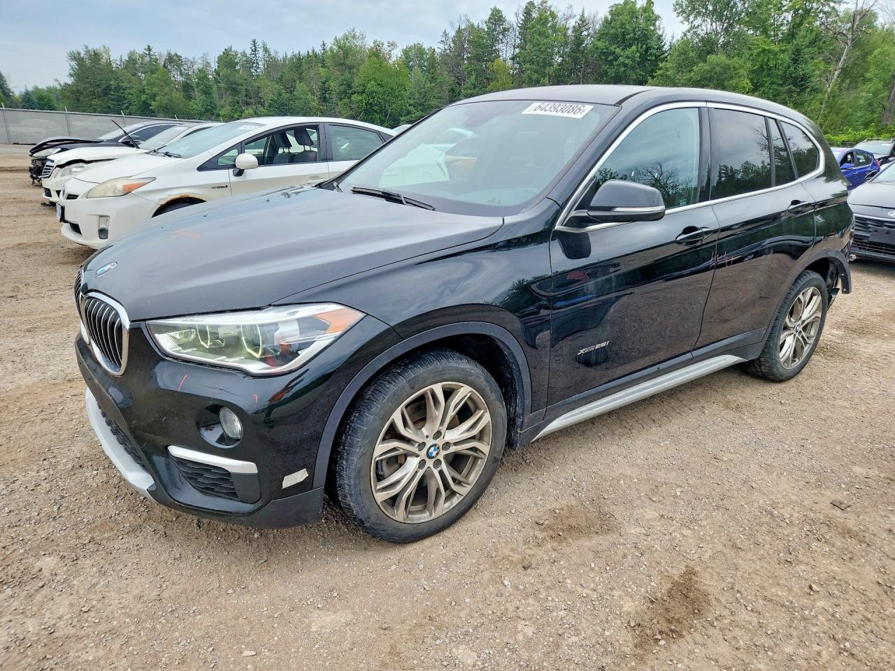 WBXHT3C35J5F88067 · 2018 BMW X1