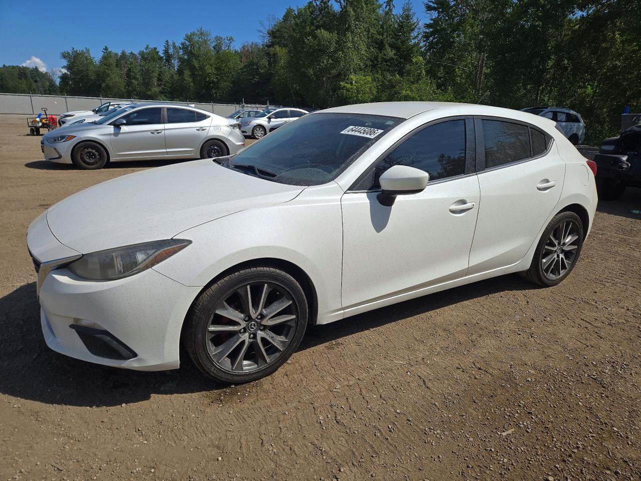 JM1BM1L75E1135584 · 2014 MAZDA 3