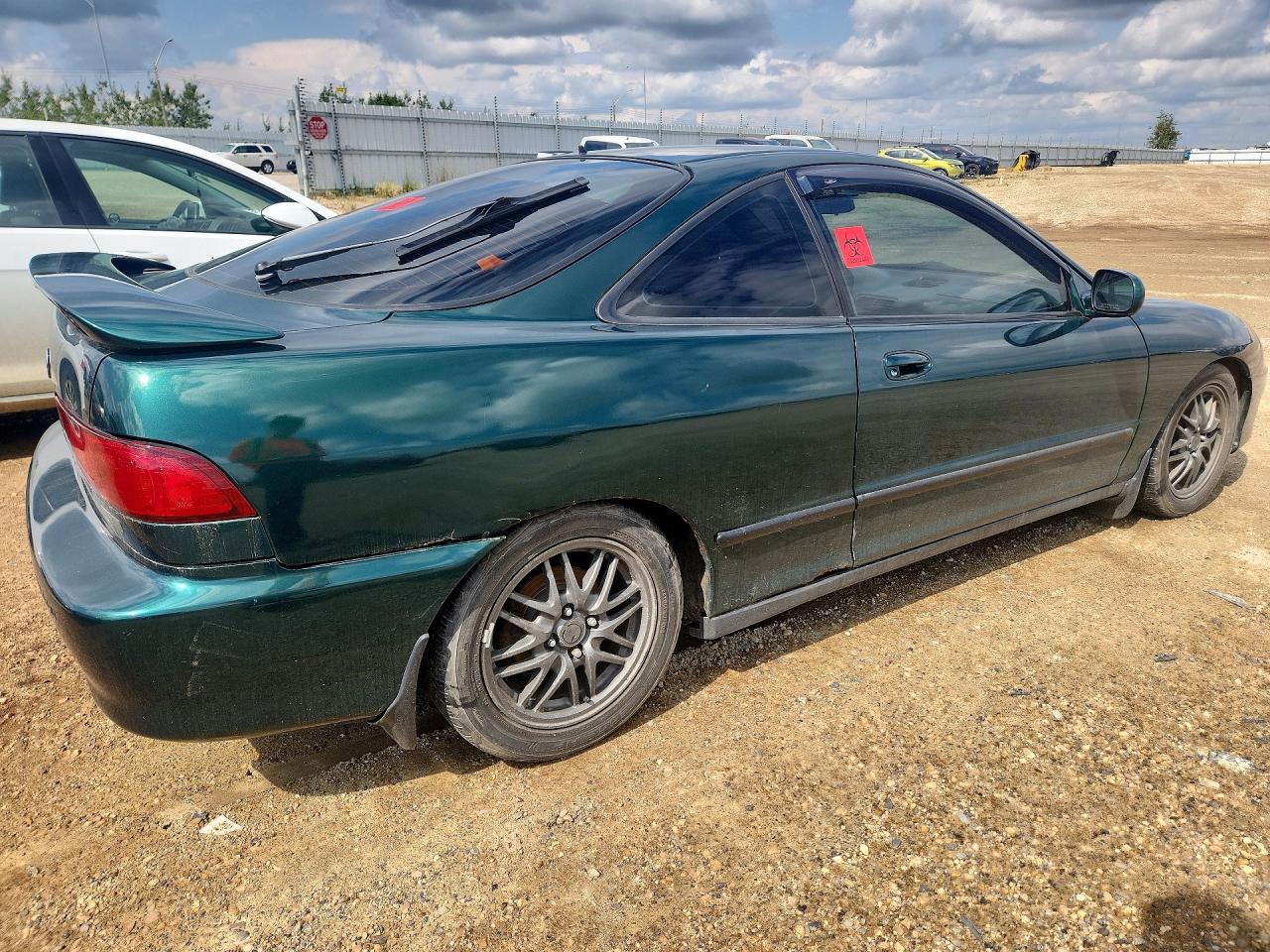JH4DC4348XS800573 · 1999 ACURA INTEGRA · 3/12