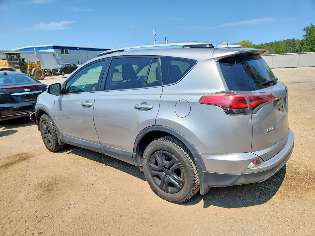 2T3ZFREV4GW306672 · 2016 TOYOTA RAV4 · 2/13