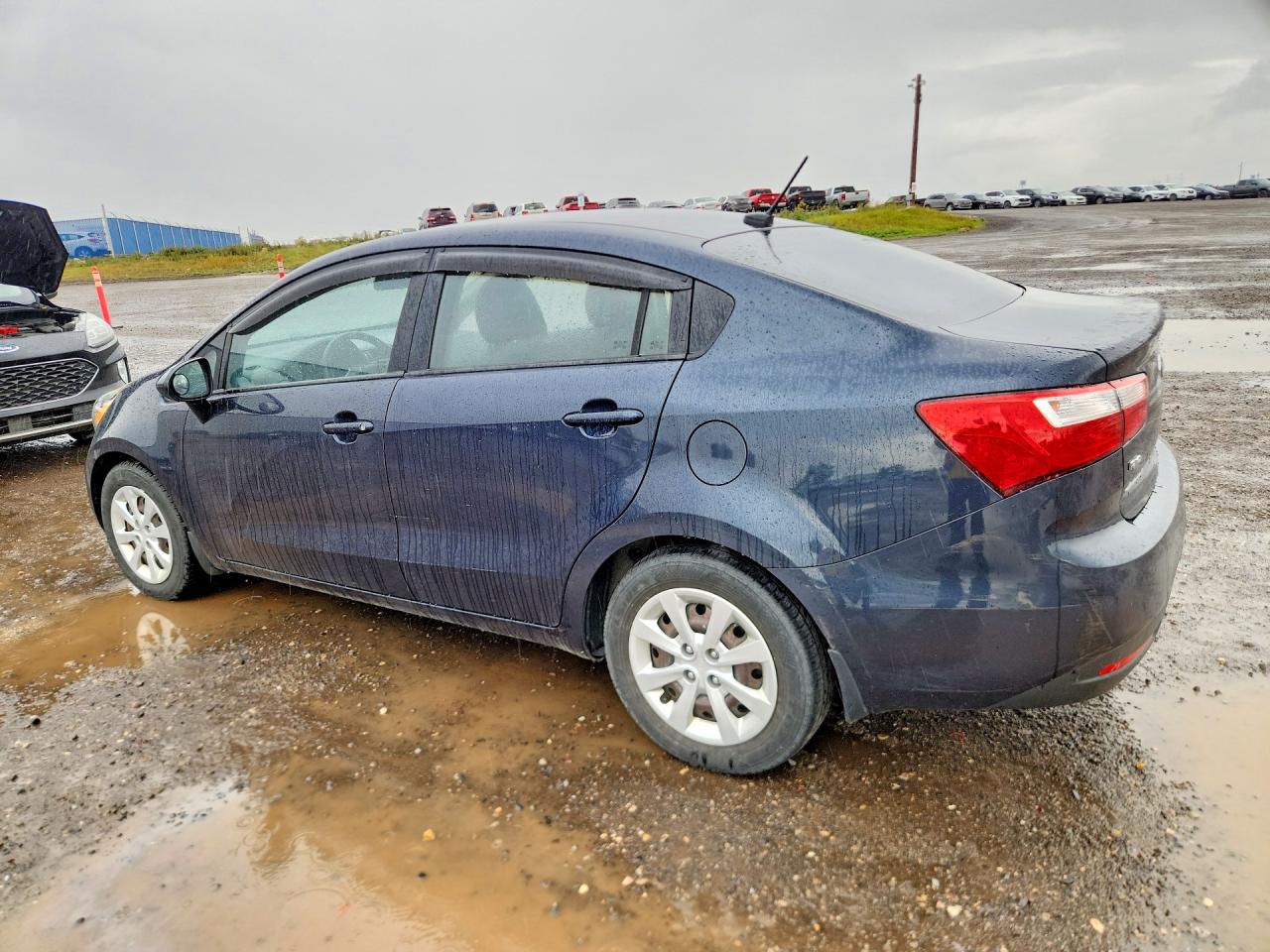 KNADM4A3XD6228769 · 2013 KIA RIO · 2/12