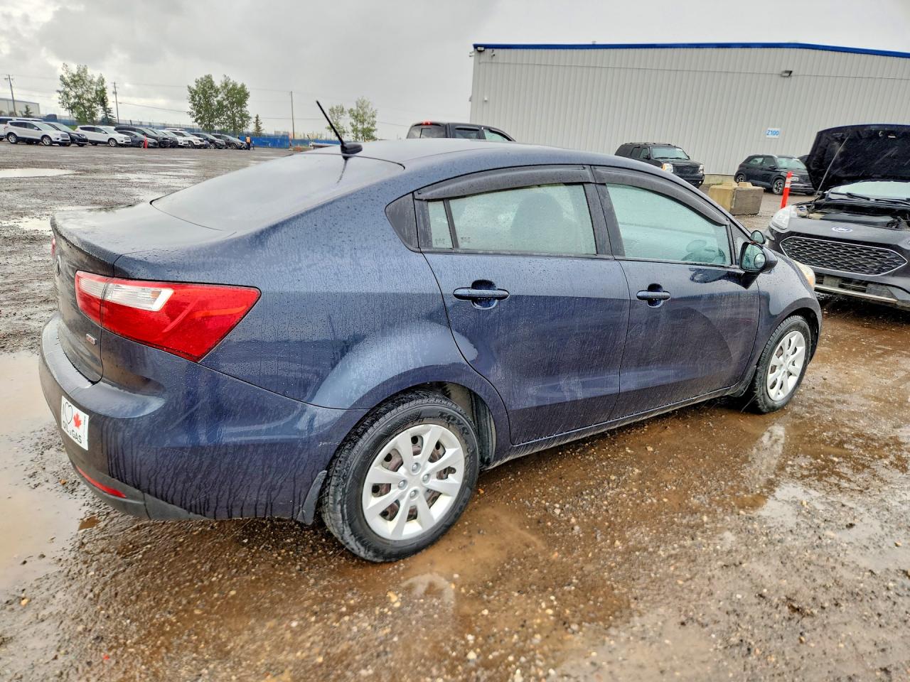 KNADM4A3XD6228769 · 2013 KIA RIO · 3/12