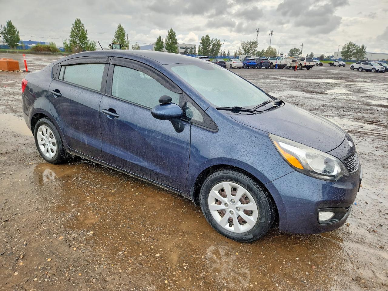 KNADM4A3XD6228769 · 2013 KIA RIO · 4/12