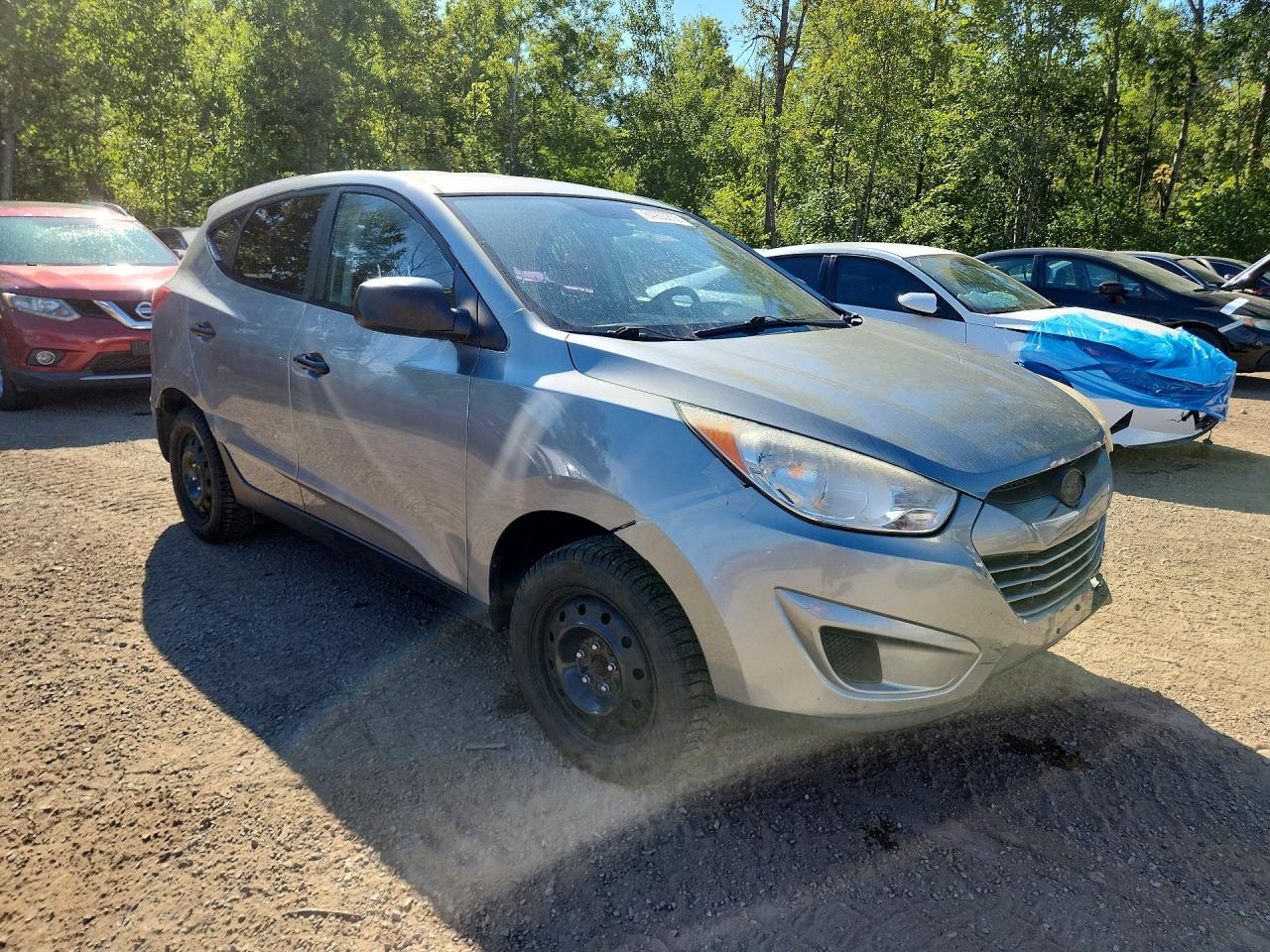 KM8JTCAC2BU252006 · 2011 HYUNDAI TUCSON · 4/13