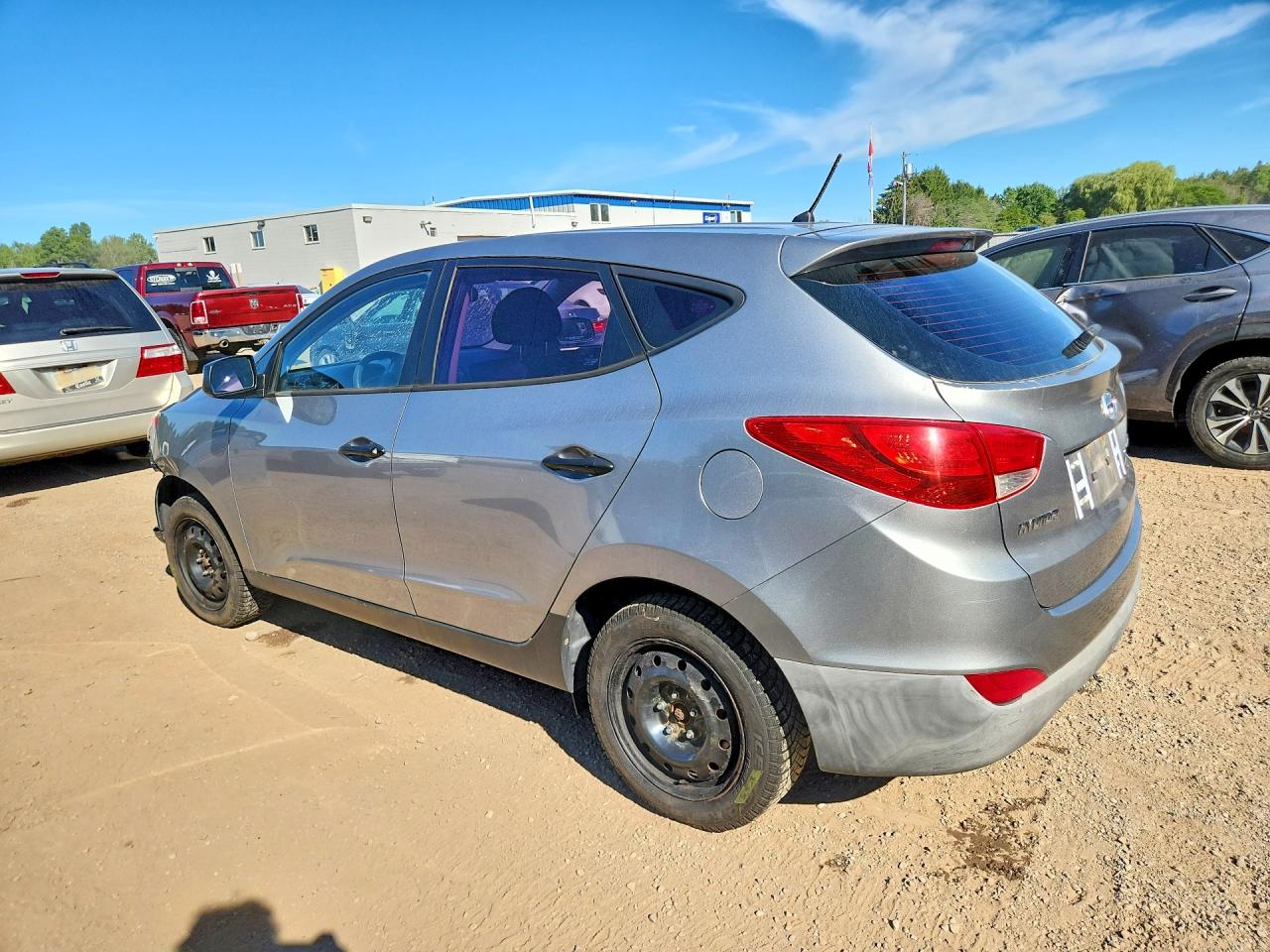 KM8JTCAC2BU252006 · 2011 HYUNDAI TUCSON · 2/13