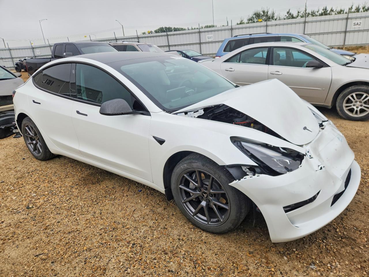 LRW3E1FA0PC871958 · 2023 TESLA MODEL 3 · 4/12