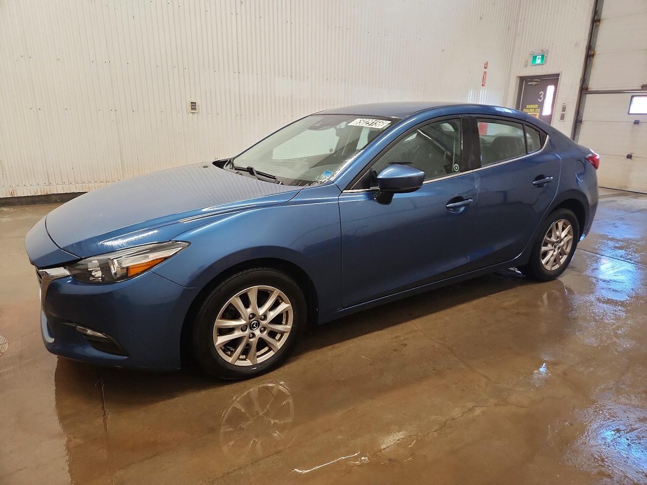 JM1BN1V78J1161908 · 2018 MAZDA 3