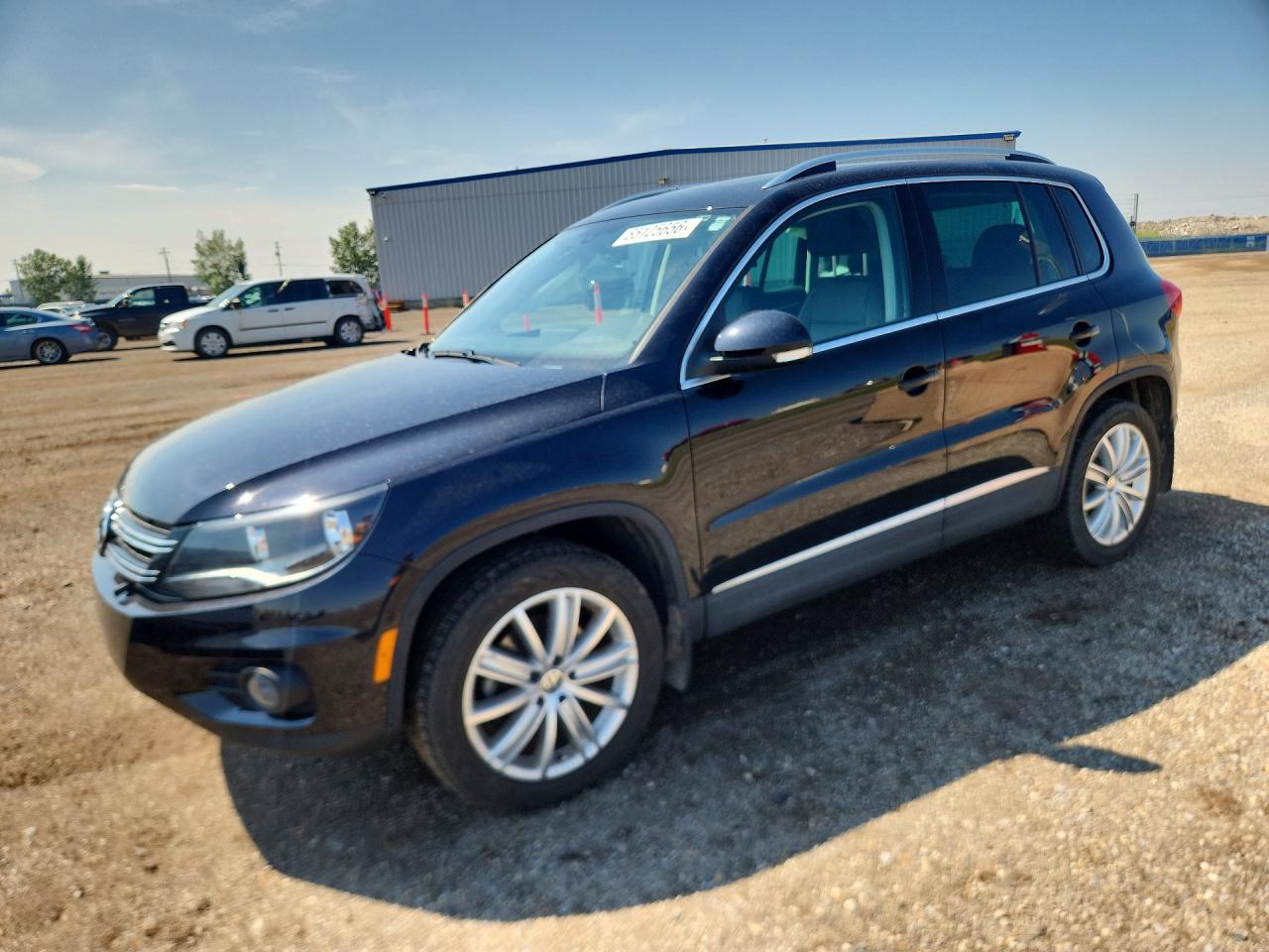 WVGJV7AX6DW524682 · 2013 VOLKSWAGEN TIGUAN