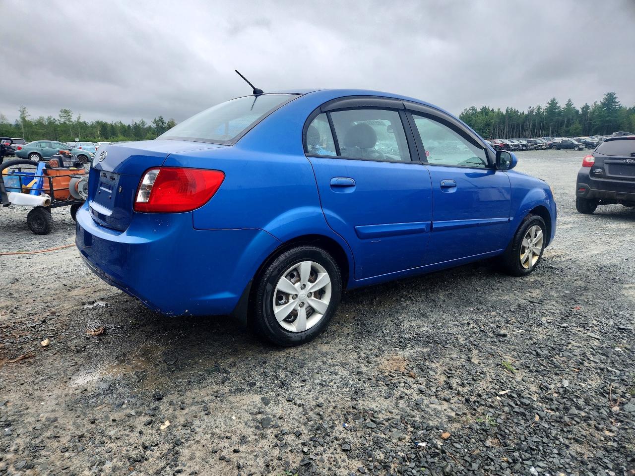 KNADH4B32A6596054 · 2010 KIA RIO · 3/12