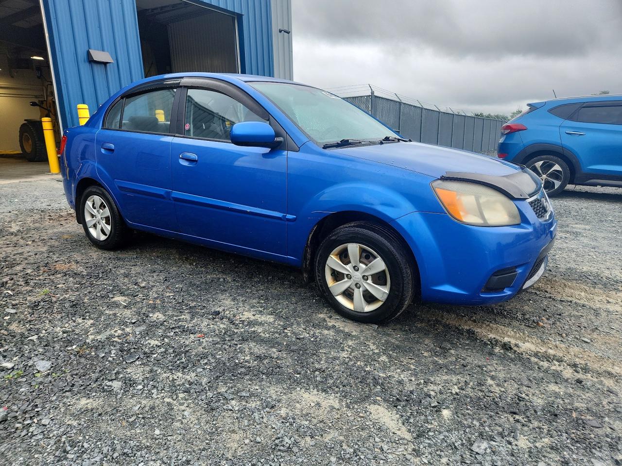 KNADH4B32A6596054 · 2010 KIA RIO · 4/12