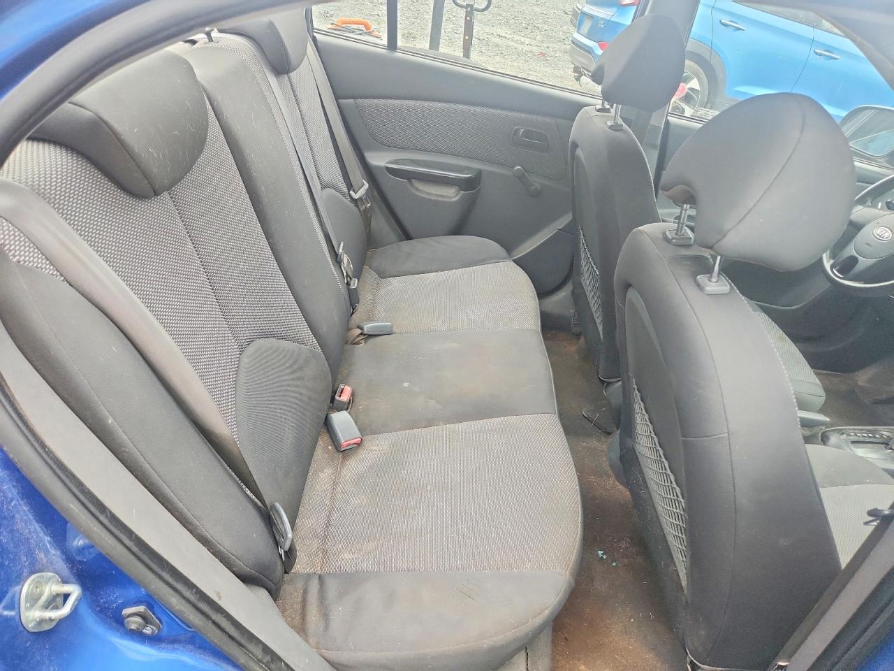 KNADH4B32A6596054 · 2010 KIA RIO · 10/12