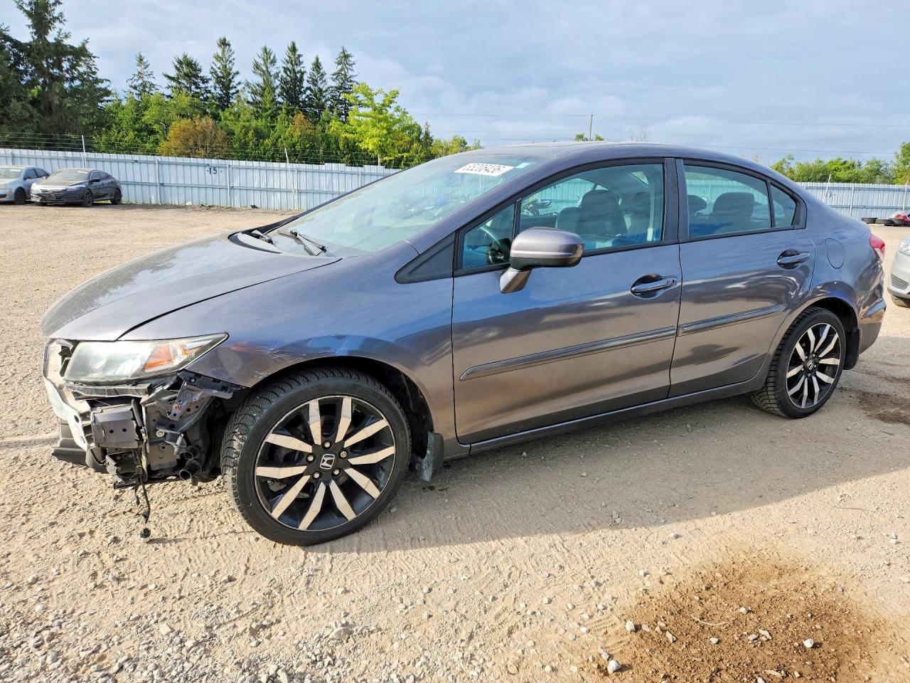 2HGFB2F71FH032286 · 2015 HONDA CIVIC