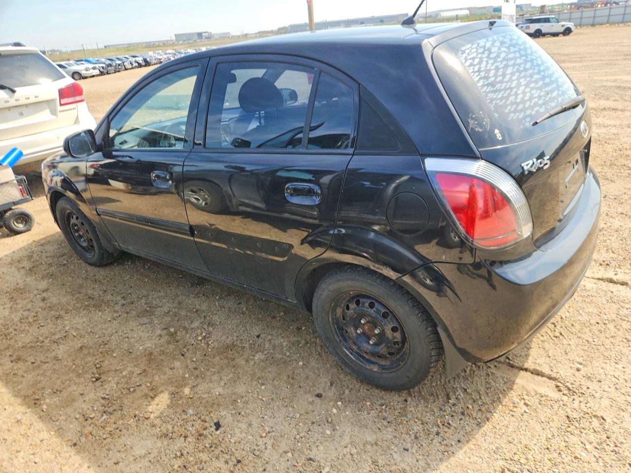 KNADH5B32B6713851 · 2011 KIA RIO · 2/12