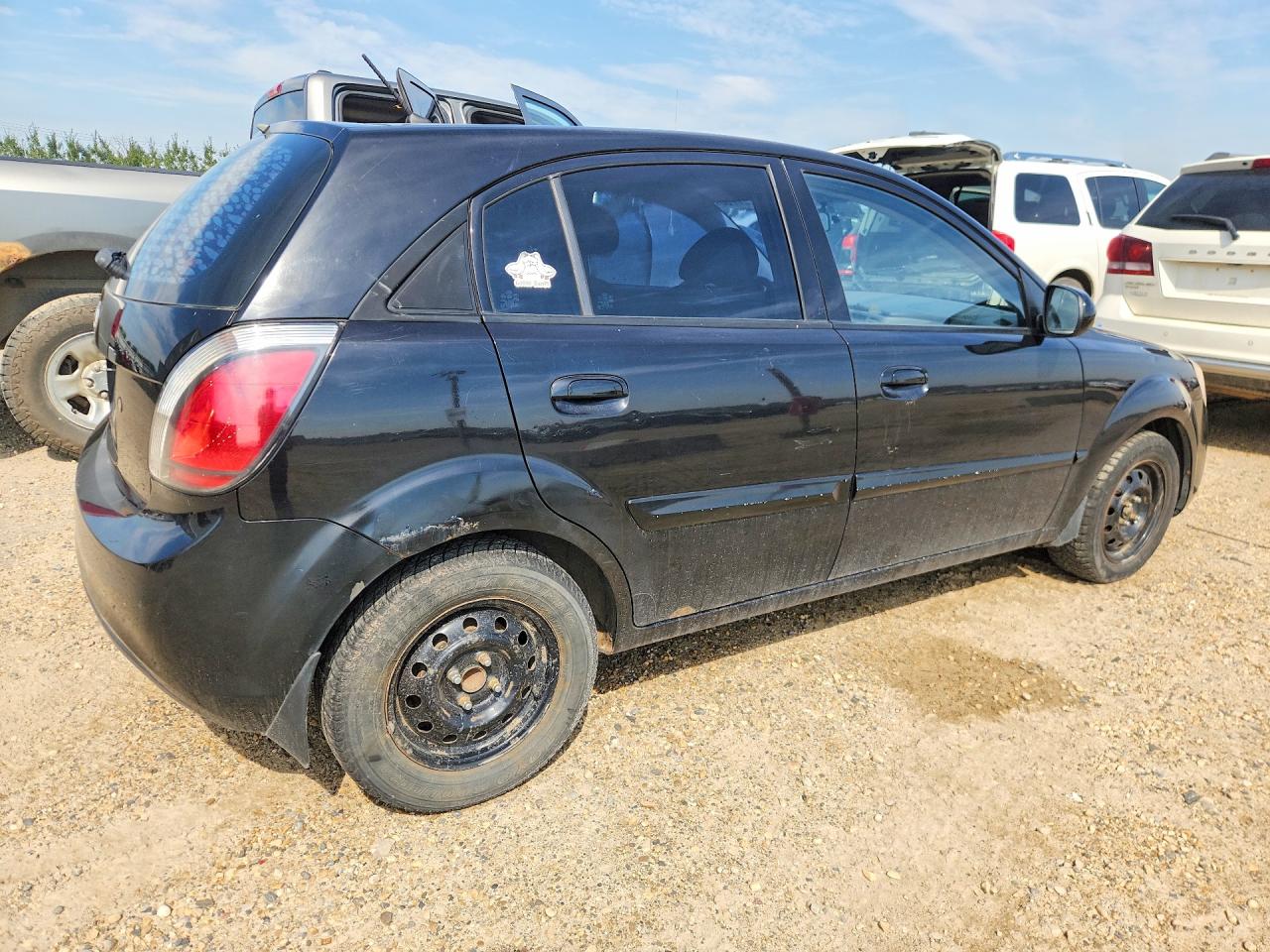 KNADH5B32B6713851 · 2011 KIA RIO · 3/12