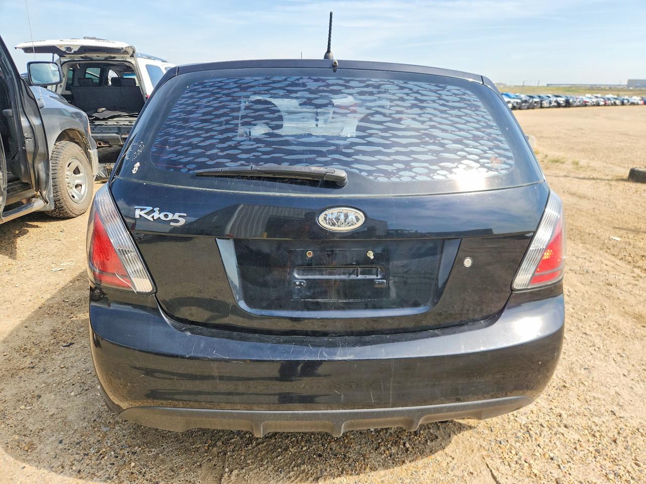 KNADH5B32B6713851 · 2011 KIA RIO · 6/12