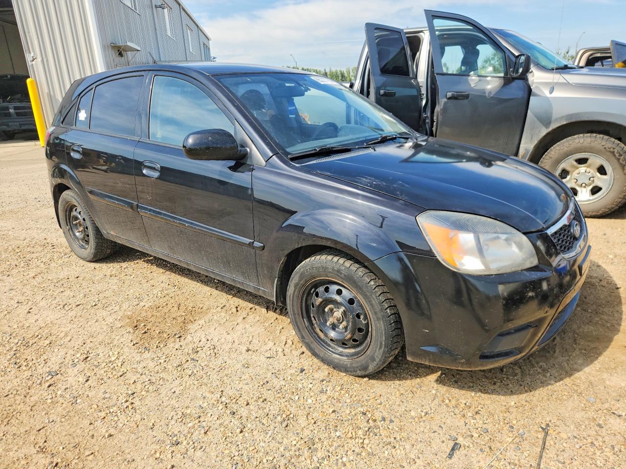 KNADH5B32B6713851 · 2011 KIA RIO · 4/12