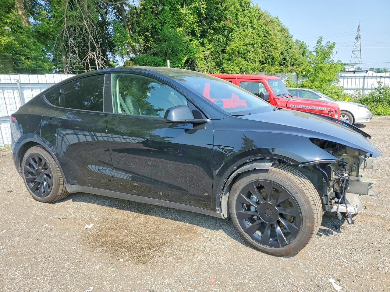 7SAYGDEE3NF421698 · 2022 TESLA MODEL Y · 4/14