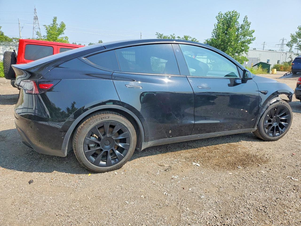 7SAYGDEE3NF421698 · 2022 TESLA MODEL Y · 3/14