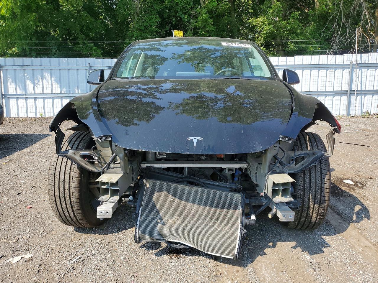 7SAYGDEE3NF421698 · 2022 TESLA MODEL Y · 5/14