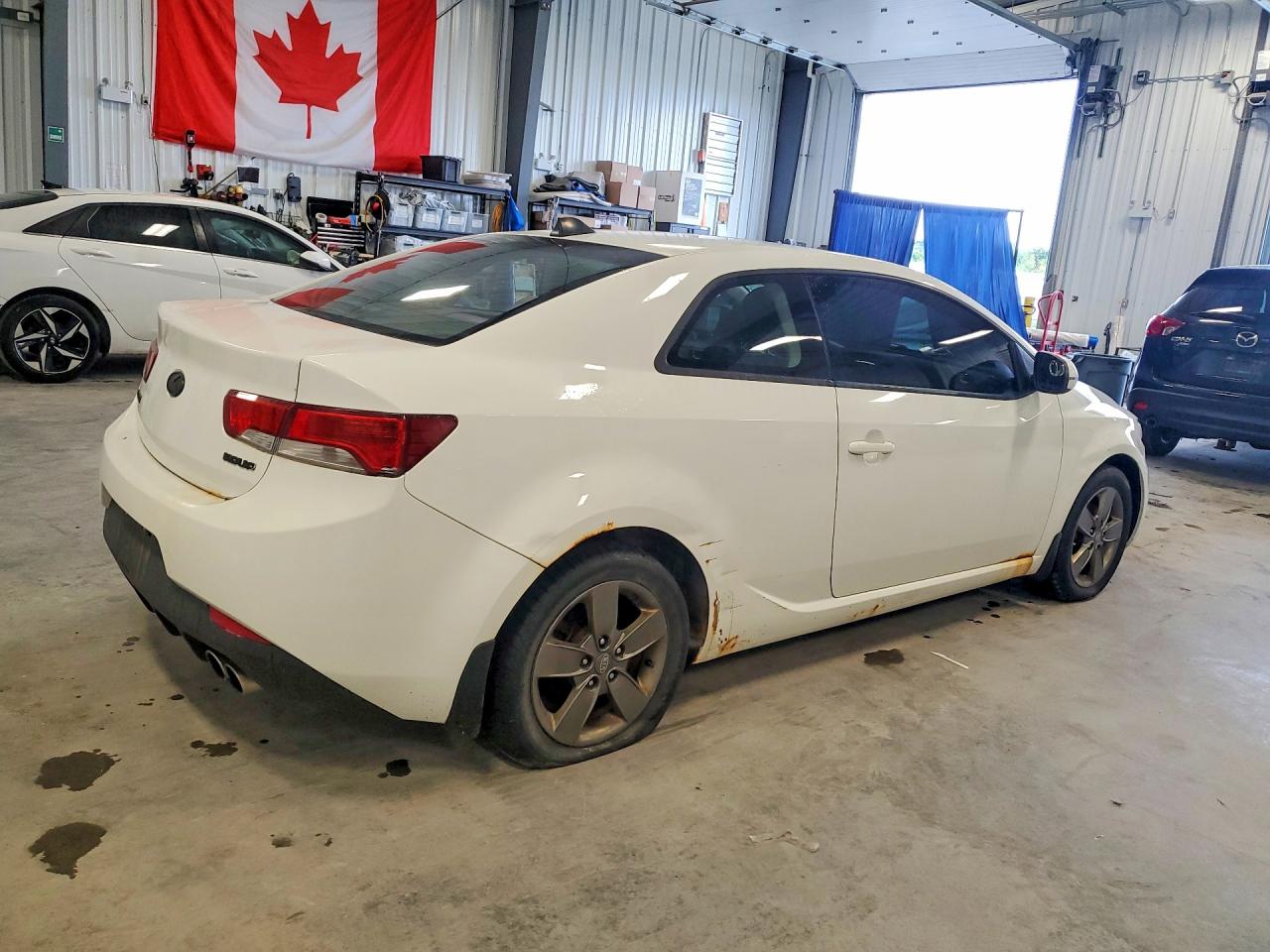 KNAFU6A21C5589596 · 2012 KIA FORTE KOUP · 3/12