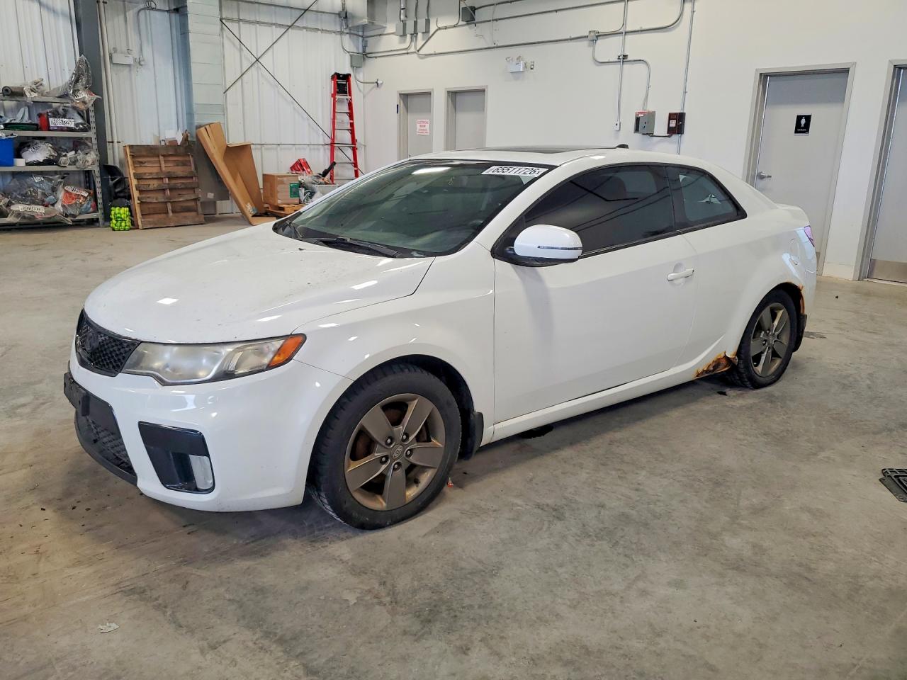 KNAFU6A21C5589596 · 2012 KIA FORTE KOUP