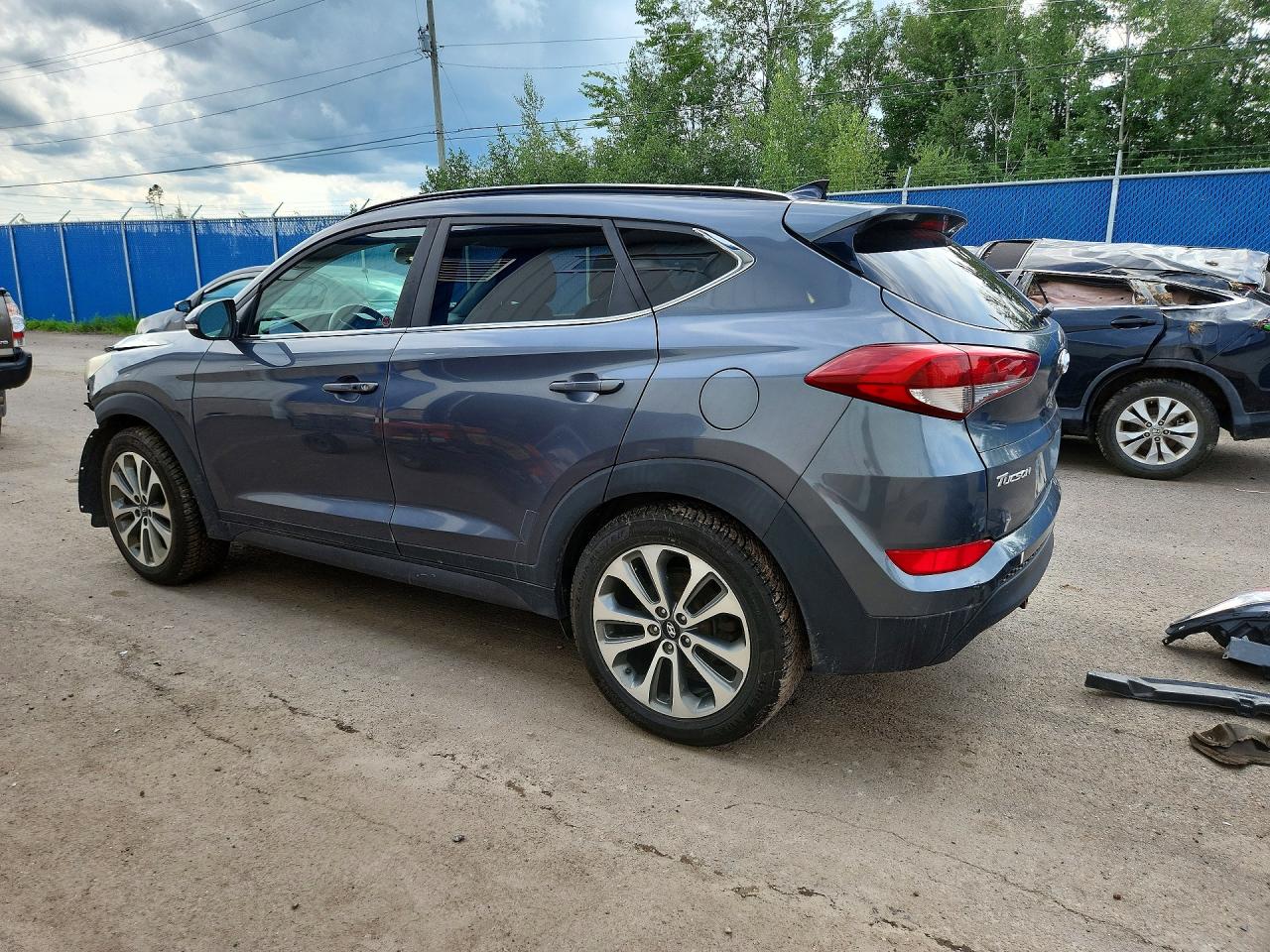 KM8J3CA44GU215877 · 2016 HYUNDAI TUCSON · 2/14