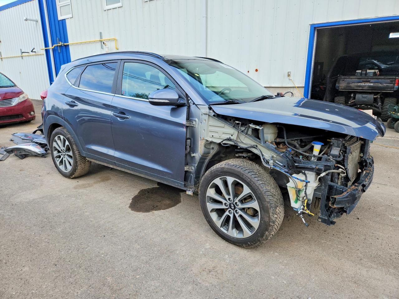 KM8J3CA44GU215877 · 2016 HYUNDAI TUCSON · 4/14
