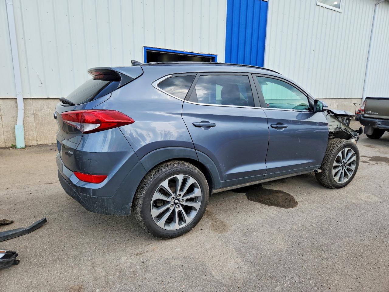 KM8J3CA44GU215877 · 2016 HYUNDAI TUCSON · 3/14