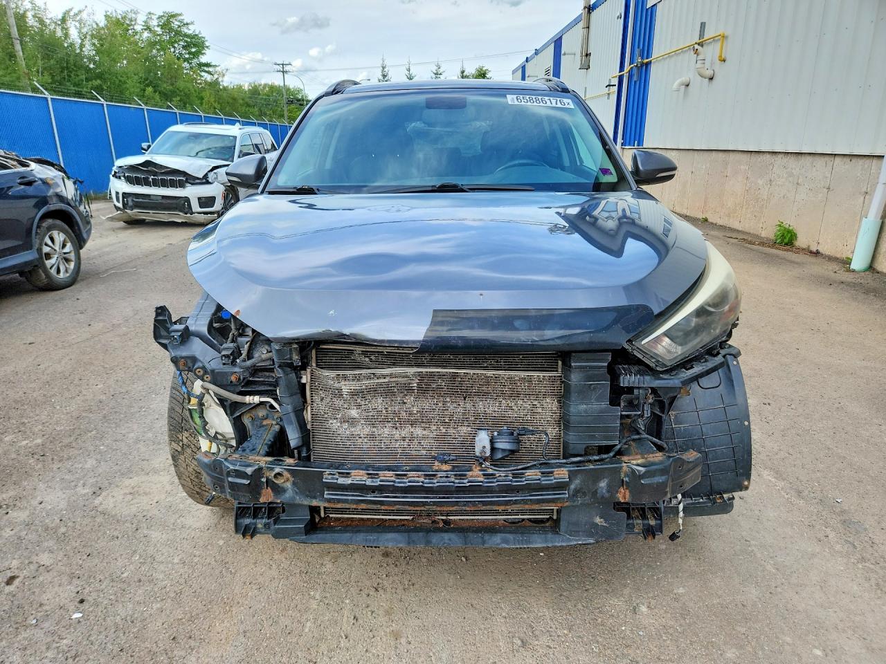 KM8J3CA44GU215877 · 2016 HYUNDAI TUCSON · 5/14