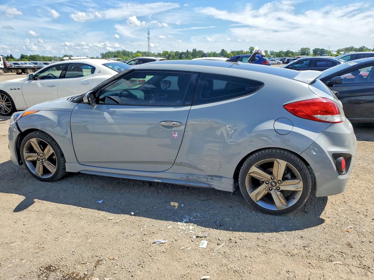 KMHTC6AE4DU174472 · 2013 HYUNDAI VELOSTER · 2/12