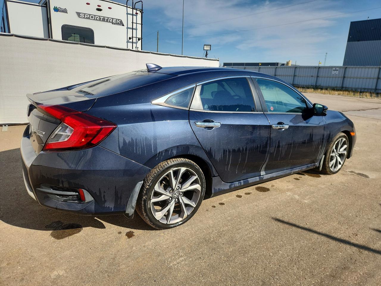 2HGFC1F97KH101825 · 2019 HONDA CIVIC · 3/12