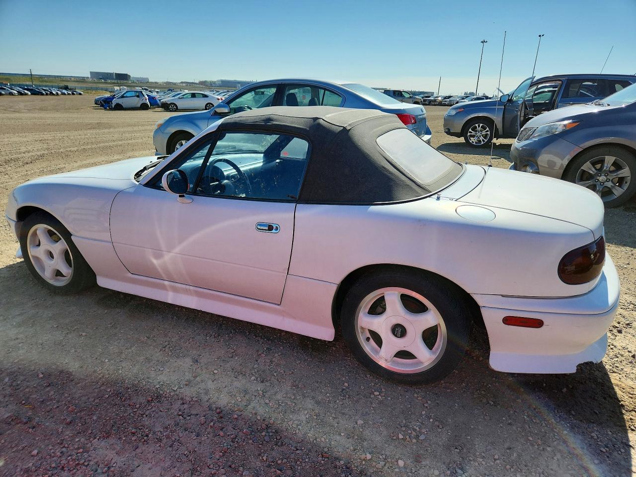 JM1NA3528L0135553 · 1990 MAZDA MX-5 MIATA · 2/12