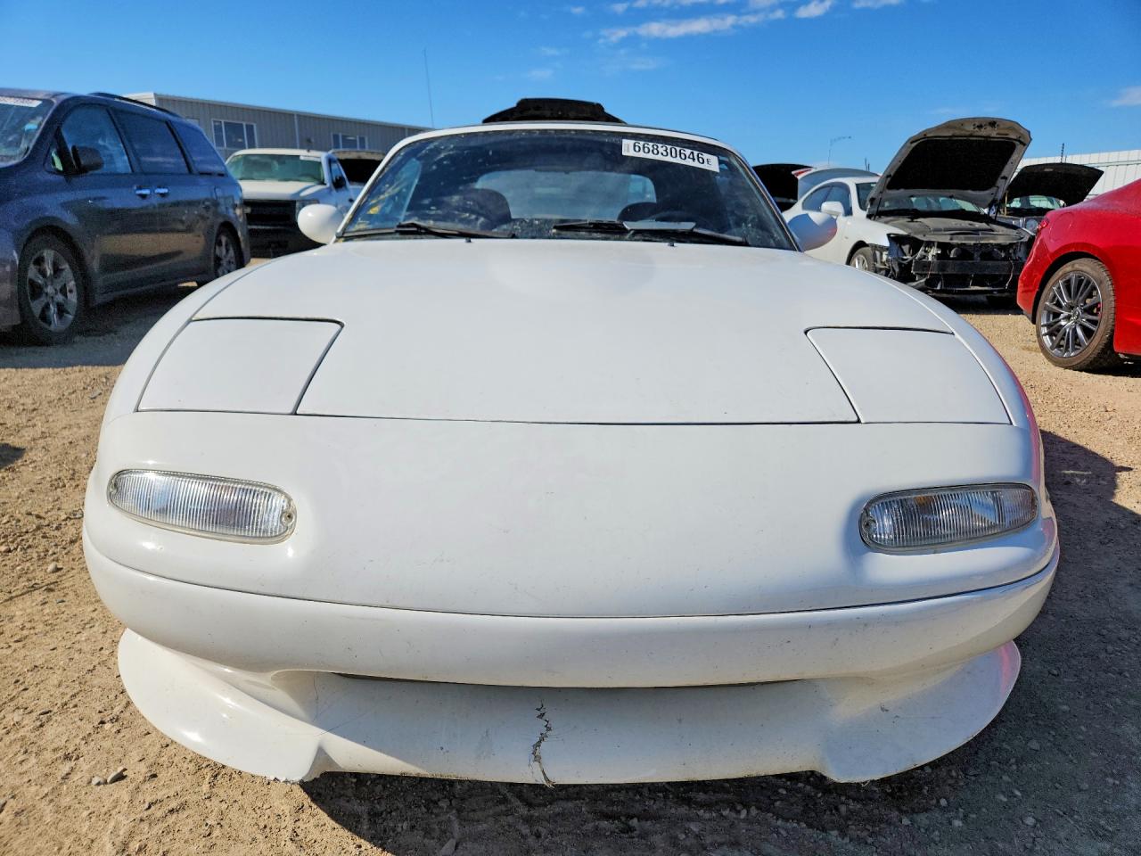 JM1NA3528L0135553 · 1990 MAZDA MX-5 MIATA · 5/12