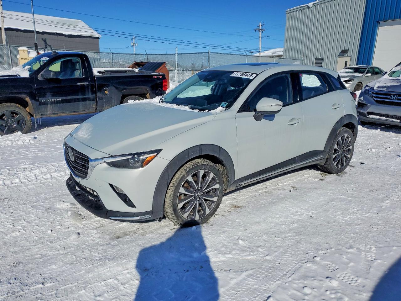 JM1DKFD77M1511047 · 2021 MAZDA CX-3